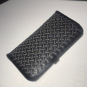 Bottega Veneta long woven black leather wallet.